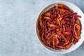 Stack of Dried Red Chili or Chilli Cayenne Pepper in Bowl Royalty Free Stock Photo