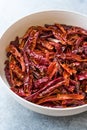 Stack of Dried Red Chili or Chilli Cayenne Pepper in Bowl Royalty Free Stock Photo