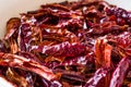 Stack of Dried Red Chili or Chilli Cayenne Pepper in Bowl Royalty Free Stock Photo