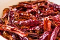 Stack of Dried Red Chili or Chilli Cayenne Pepper in Bowl Royalty Free Stock Photo