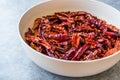 Stack of Dried Red Chili or Chilli Cayenne Pepper in Bowl Royalty Free Stock Photo