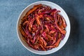 Stack of Dried Red Chili or Chilli Cayenne Pepper in Bowl Royalty Free Stock Photo