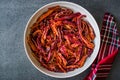 Stack of Dried Red Chili or Chilli Cayenne Pepper in Bowl Royalty Free Stock Photo