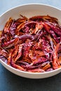 Stack of Dried Red Chili or Chilli Cayenne Pepper in Bowl Royalty Free Stock Photo