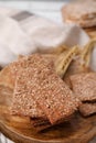 Stack of dry rye crispbreads on table, closeup Royalty Free Stock Photo
