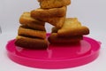 Stack of dry toast on Plastics plate. Close Up Pile of toasted bread slices. Toast loaf on white background Royalty Free Stock Photo