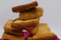 Stack of dry toast on Plastics plate. Close Up Pile of toasted bread slices. Toast loaf on white background Royalty Free Stock Photo