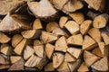 A stack of dry wood for a fireplace and a fire in the backyard Royalty Free Stock Photo