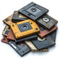 Stack of dusty, outdated floppy disks and CDs representing obsolete storage tech Royalty Free Stock Photo