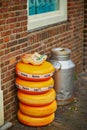 Stack of Dutch cheese wheels on a street in Amsterdam, the Netherlands Royalty Free Stock Photo