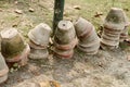 Stack of Earthen flower tubs on garden. Clay flower pots on the garden front yard Royalty Free Stock Photo