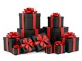 Stack of elegant gift boxes with red ribbons Royalty Free Stock Photo