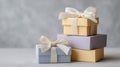 Stack of elegant gift boxes with ribbons on neutral background. Boxing Day Royalty Free Stock Photo
