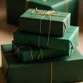 Stack of elegantly wrapped green gifts with gold ribbon Royalty Free Stock Photo