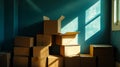 a stack of empty cardboard boxes and packing tape in the corner of an office Royalty Free Stock Photo