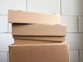 A stack of empty cardboard boxes. Waste paper collection at a construction site. Royalty Free Stock Photo