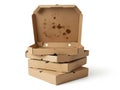 Stack of empty pizza boxes isolated on white background Royalty Free Stock Photo