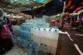 Stack of empty plastic water containers in Sidi Harazem