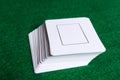 Stack of white cards on the green table Royalty Free Stock Photo