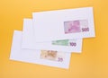 Stack of envelopes with euro bills. Corruption in business, illegal black salary concept Royalty Free Stock Photo