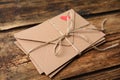 Stack of envelopes on wooden table. Love letters