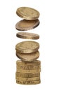Stack of falling one pound and two euro coins on white background Royalty Free Stock Photo