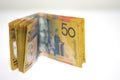 Stack of fifty Australian dollar bills on white background. Royalty Free Stock Photo