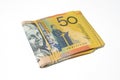 Stack of fifty Australian dollar bills on white background. Royalty Free Stock Photo