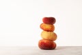 Stack of Fig peaches on the table, side view. Flat donut peaches. Ripe fruits Royalty Free Stock Photo