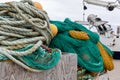 a stack of fishing nets and ropes for mooring at a harbor Royalty Free Stock Photo