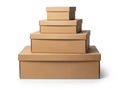 Stack of five brown cardboard boxes isolated on white background Royalty Free Stock Photo