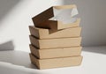 A stack of five brown cardboard boxes with a minimalist design is Royalty Free Stock Photo