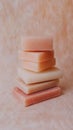 A stack of five different colored bars of soap. Generative AI
