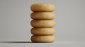 Stack of five light-tan donuts Royalty Free Stock Photo