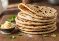 A stack of flatbreads with a golden-brown surface and char marks Royalty Free Stock Photo