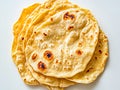 A stack of flatbreads sitting on top of each other on a white surface Royalty Free Stock Photo