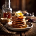 Morning Delight: Golden-Brown Pancakes with Maple Syrup and Butter