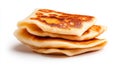Stack of fluffy golden flatbreads with crispy spots on white background Royalty Free Stock Photo