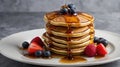 Delicious Pancake Stack Drizzled with Maple Syrup and Fresh Berries Ready to Eat Royalty Free Stock Photo