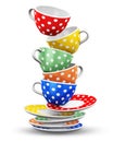 Stack of flying color polka dot coffee cups Royalty Free Stock Photo