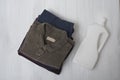 Stack of folded clothes and detergent bottle. Top view Royalty Free Stock Photo