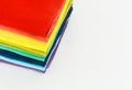 Stack of folded colorful t-shirt on white background Royalty Free Stock Photo