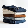 A stack of folded denim jeans in various colors and styles Royalty Free Stock Photo