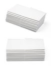 Stack of folded disposable paper tissues on white background