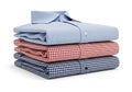 Stack of folded dress shirts isolated on white background Royalty Free Stock Photo