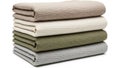 Stack of folded fabrics isolated on white background Royalty Free Stock Photo