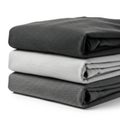 Stack of folded gray fabrics on white background Royalty Free Stock Photo