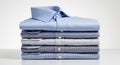 Stack of Folded Men\'s Dress Shirts in Various Blue Patterns men\'s shirts folded shirts Royalty Free Stock Photo