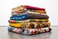 stack of folded quilts showcasing various patterns Royalty Free Stock Photo