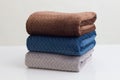 Stack of folded soft blankets isolated Royalty Free Stock Photo